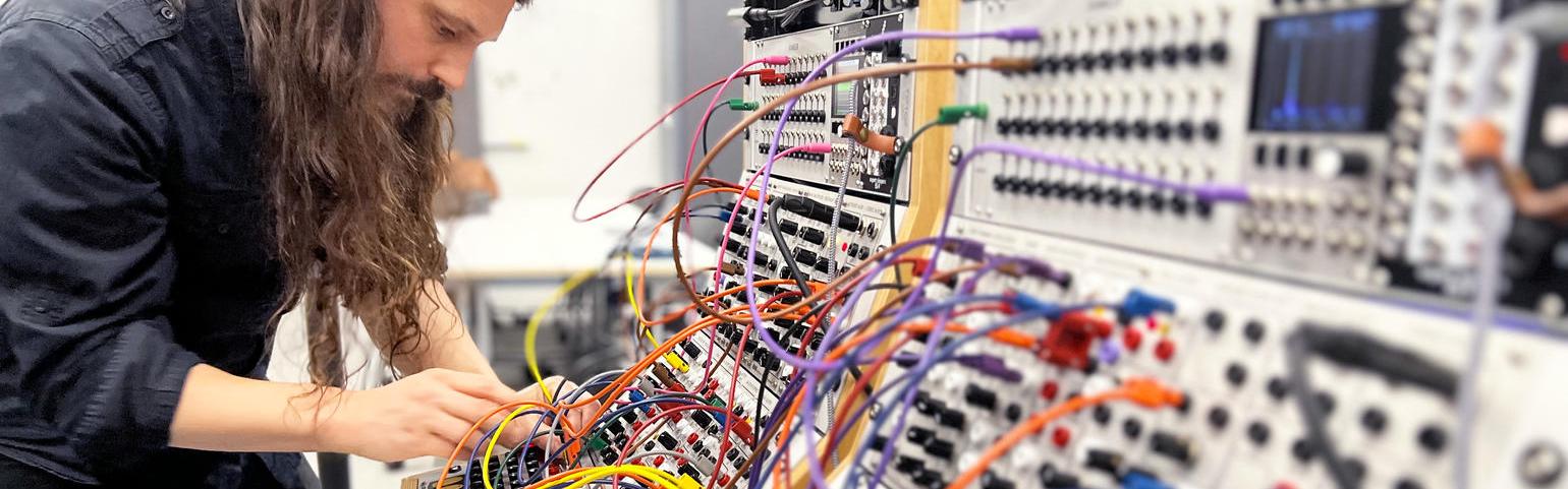 person at sound board