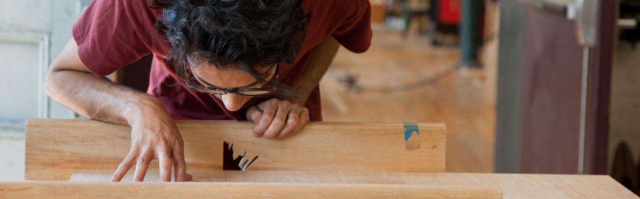 student working in the wood shop