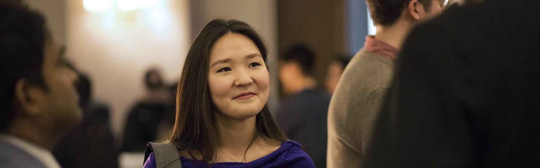 student at networking event