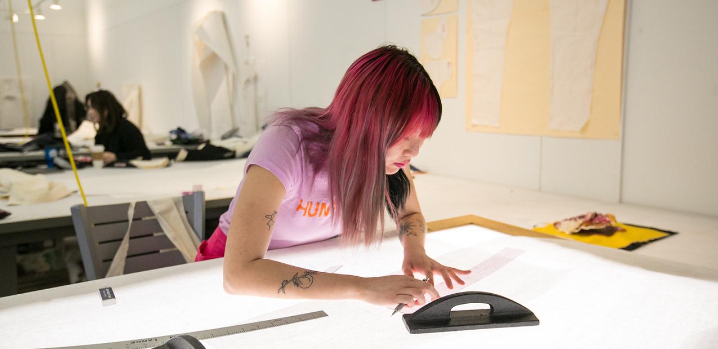 student measuring work