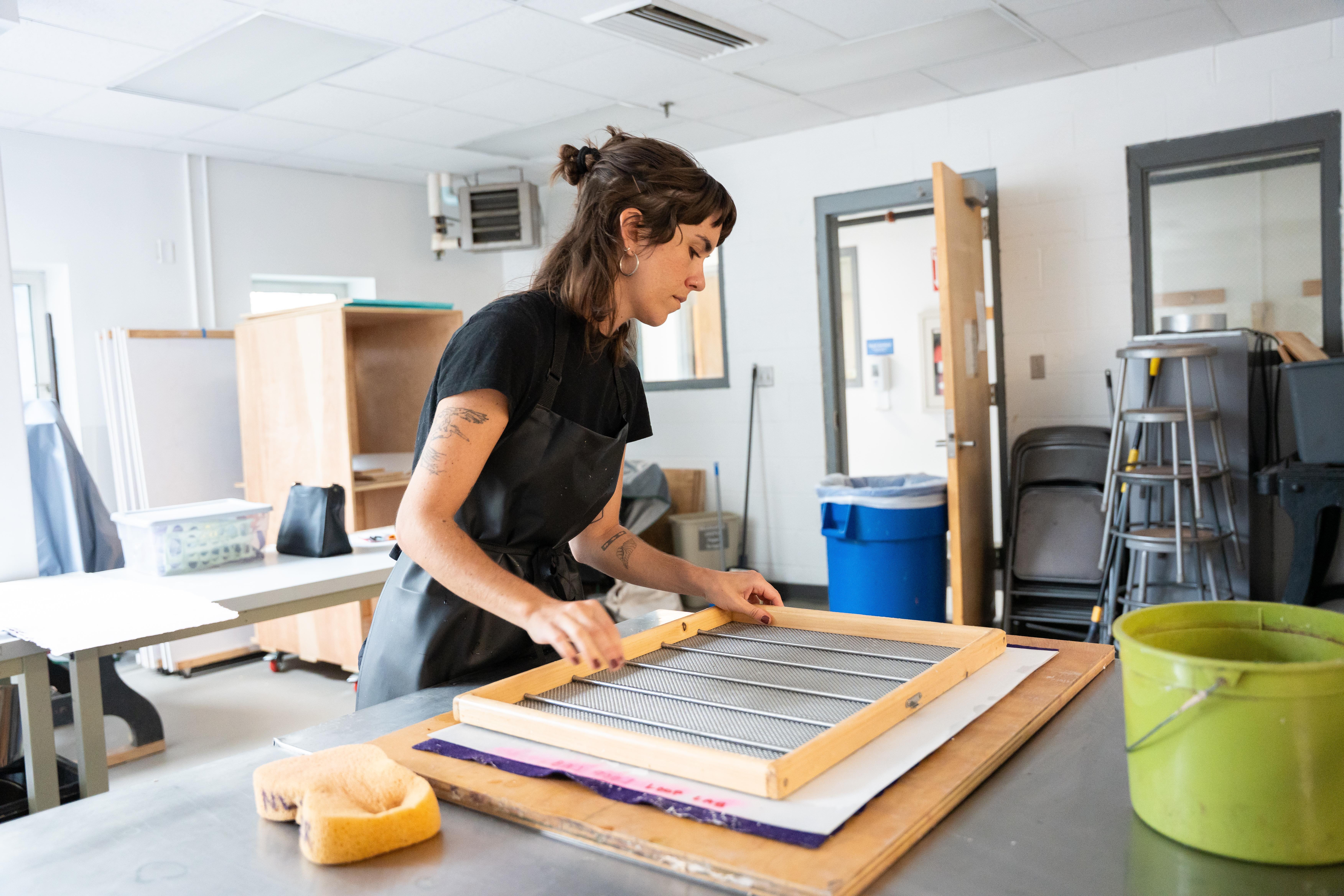 student in the printshop